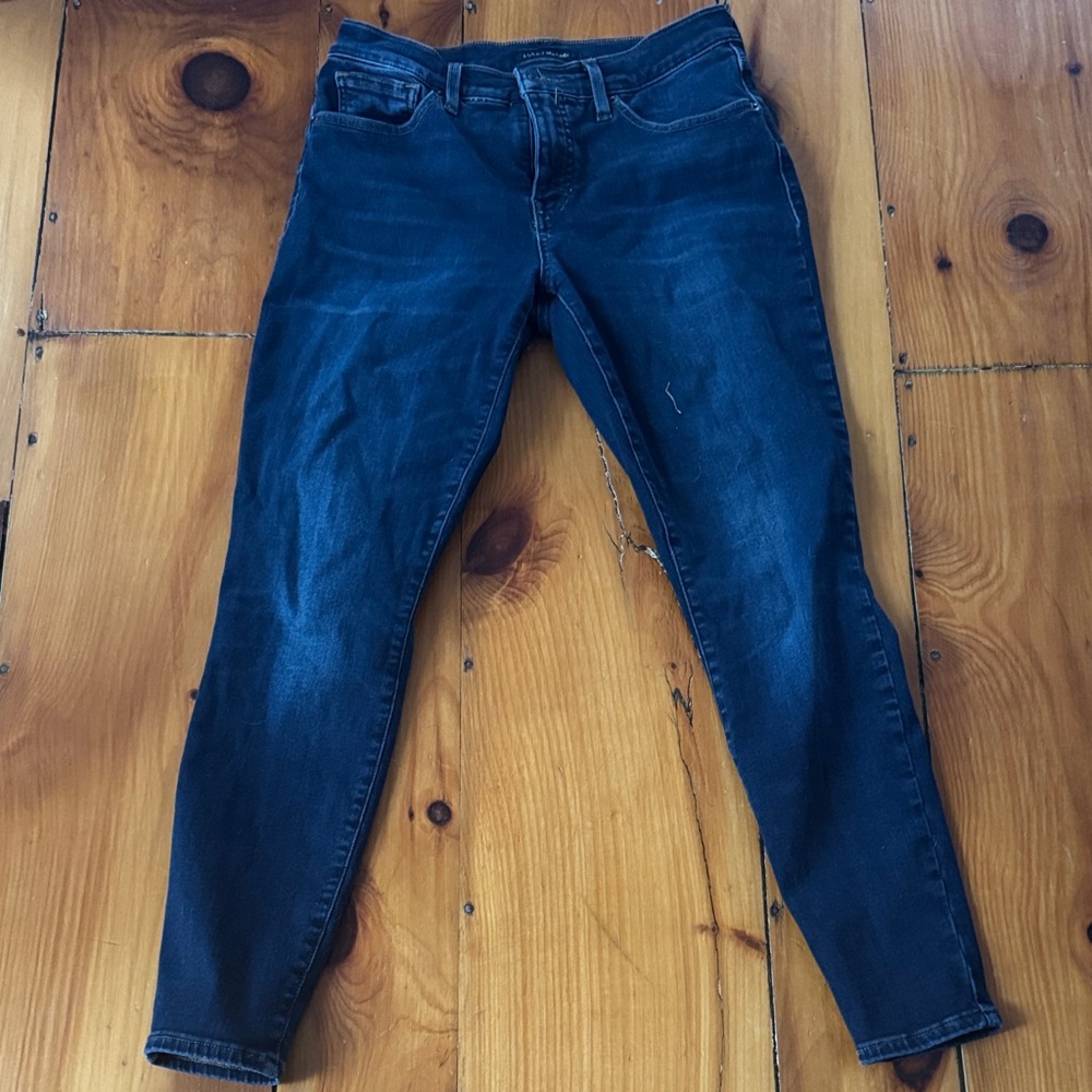 28A Lucky mid- rise skinny jeans